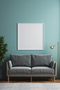 Frame mockup poster on blue wall above gray couch and plant, front view. Vintage minimalist interior with blank white picture.