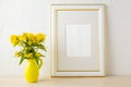 Frame mockup with small yellow flowers in stylized pitcher vase Royalty Free Stock Photo