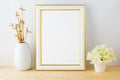 Frame mockup with white flowerpot