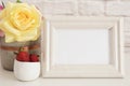 Frame Mockup. White Frame Mock Up. Cream Picture Frame, Vase With Pink Roses, Strawberries In Gold Bowl. Product Frame Mockup. Wal Royalty Free Stock Photo