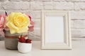 Frame Mockup. White Frame Mock Up. Cream Picture Frame, Vase With Pink Roses, Strawberries In Gold Bowl. Product Frame Mockup. Wal Royalty Free Stock Photo