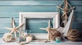 Frame and nautical summer decorations on wooden table