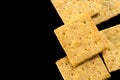 Frame from organic grain crackers isolated on black