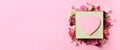 Frame of pink flowers over punchy pastel background. Valentines day, Woman day concept. Spring or summer banner with copy space