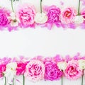 Frame of pink and white flowers on white background. Floral composition. Flat lay, top view. Royalty Free Stock Photo