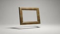Frame possibly made of aged wood or bronze is suspended in mid air Royalty Free Stock Photo