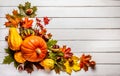 Frame. Pumpkins, maple leaves and chestnuts on a wooden background. Congratulation Royalty Free Stock Photo