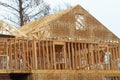 frame and rafters of a house under construction timber plank wall Royalty Free Stock Photo