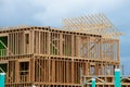 frame and rafters of a house under construction timber plank wall wooden work timber development Royalty Free Stock Photo