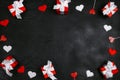 Frame of red gifts and hearts on black background. Valentine`s day concept Royalty Free Stock Photo