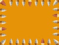 Frame of the Rows of Two Types Soft Serve Ice Cream Cones Isolated on Orange Background Royalty Free Stock Photo