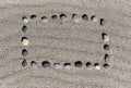 .Frame on the sand on the beach with skates on a sunny day copy space Royalty Free Stock Photo