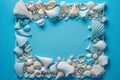 Frame of seashells on the light blue background. Copy space. Generative AI Royalty Free Stock Photo