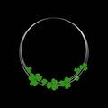 Silver circle border frame with shamrocks on black background Royalty Free Stock Photo