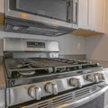 Frame Square Close up of the range under wall mounted microwave inside a modern kitchen Royalty Free Stock Photo