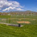 Frame Square Softball or Baseball field with view of mountain and sky on a sunny day Royalty Free Stock Photo