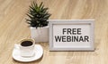 Frame with text Free webinar.