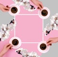 Frame for text white flowers of coffee on a pink background. Good morning. Congratulations. Four cups. Empty space