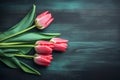 Frame of tulips on turquoise rustic wooden background. Spring flowers. Neural network AI generated Royalty Free Stock Photo