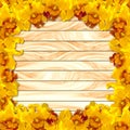 Frame Yellow orchid on wood plank background