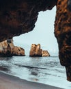 Framed Beach shot with rock formation Praia do Pinhao Lagos, Algarve, Portugal