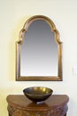 Framed mirror with decorative bowl Royalty Free Stock Photo