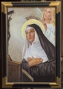 Framed painting of Saint Catherine of Siena in San Gaetano in Florence, Italy.