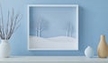 A framed picture of a winter scene with trees and a bird Royalty Free Stock Photo