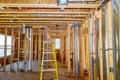 Framed residential home with basic rough plumbing completed on new construction Royalty Free Stock Photo