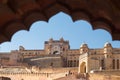 Framed view of the honey toned impressive Amber Fort, famous tourist attraction at Jaipur, Rajasthan, India. Daylight, clear blue Royalty Free Stock Photo