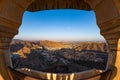 Framed view of the impressive landscape and cityscape from above at Amber Fort, famous travel destination in Jaipur, Rajasthan, In