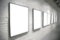 Frames on brick white wall Royalty Free Stock Photo