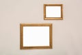 Frames with empty canvases on wall in modern art gallery