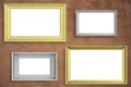 Frames golden and silver isolated on brown wall background copy space, 3d illustration Royalty Free Stock Photo