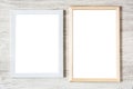 Frames mockup on white wooden table. Royalty Free Stock Photo