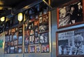 Frames with photos of famous guests on the wall at Harry`s Cafe de Wheels