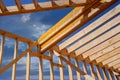 A framing beam supports the layout of the joists in a newly built wooden home. Royalty Free Stock Photo