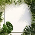 Framing border with tropical leaves on white background backdrop and copy space.