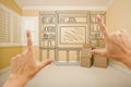 Framing Hands In Empty Room with Shelf Drawing on Wall Royalty Free Stock Photo