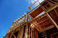 Framing of house Closeup new stick built home under construction under blue sky construction and real estate Royalty Free Stock Photo