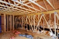 Close-up new stick built home under construction under blue sky Framing structure wood frame of wooden houses home Royalty Free Stock Photo