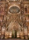 Illuminated facade of the cathedral of Notre Dame in Strasbourg at night Royalty Free Stock Photo