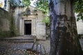 France, Arles, old church and tree.