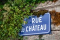 France Beaune 2019-06-20 Closeup authentic vintage steel or metal french street plate, french text - Rue de Chateau on vintage Royalty Free Stock Photo
