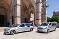 France Beaune 2019-06-19 Image of silver car hearse Mercedes E classe and Mercedes Vito parking on the street near church. Concept