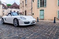 France Beaune 2019-06-19 Image of white german car Porsche Boxster parking on european street