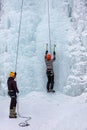 France, Bessans - January 27, 2019: Training athletes at the winter ice climbing wall.