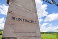 France Burgundy 2019-06-20 closeup stone pillows with vintage plate, nameboard of Montrachet grand cru vineyard