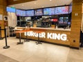 Burger King - A restaurant in the city center, empty with no people, colorful advertisements for