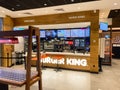 Burger King - A restaurant in the city center, empty with no people, colorful advertisements for